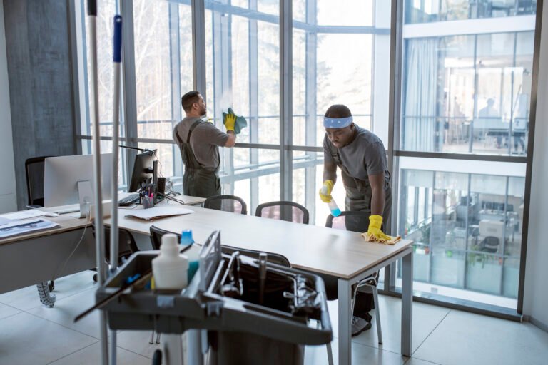 full shot men cleaning office